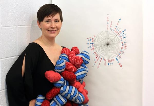 Artist wears her heart, and her accomplishments, on her sleeve