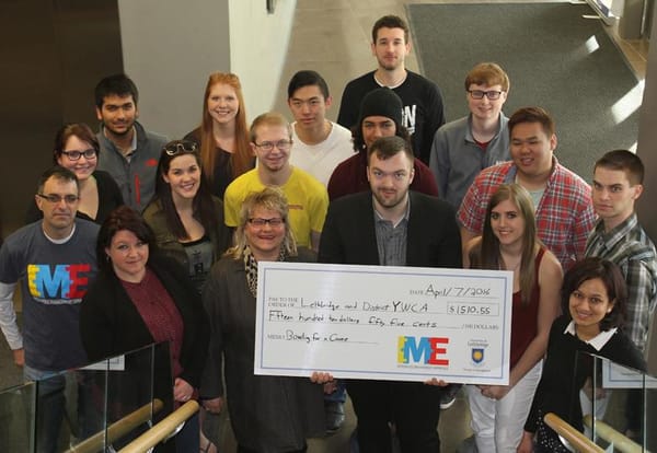 Bowling event nets IME class donation to Harbour House